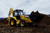 - New Holland B100B 